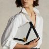 Creme/Schwarze Umhängetaschen aus Wildleder von Ralph Lauren für Damen mit Polo-ID-Umschlag