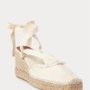 Cremefarbene flache Keilschuhe aus Canvas mit Fransenbesatz für Damen von Ralph Lauren