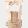 Cremefarbene flache Keilschuhe aus Canvas mit Fransenbesatz für Damen von Ralph Lauren