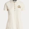 Cremefarbene Poloshirts aus Piqué mit Perlenwappen von Ralph Lauren für Damen