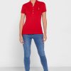 Rote Poloshirts für Damen von Ralph Lauren mit Knopfdetail Rote Poloshirts für Damen von Ralph Lauren mit Knopfdetail