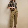 Schwarze Ralph Lauren Keara Metallic-Hemden mit Rüschenbesatz für Damen